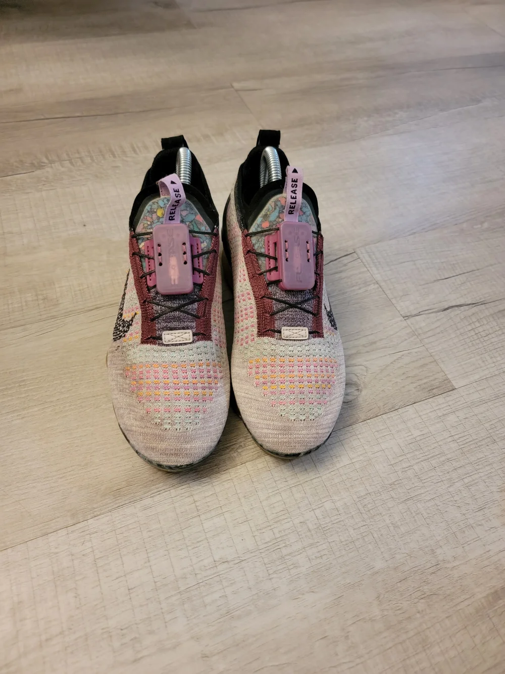 Nike Multicolor Flyknit Sneakers with Pink Accents
